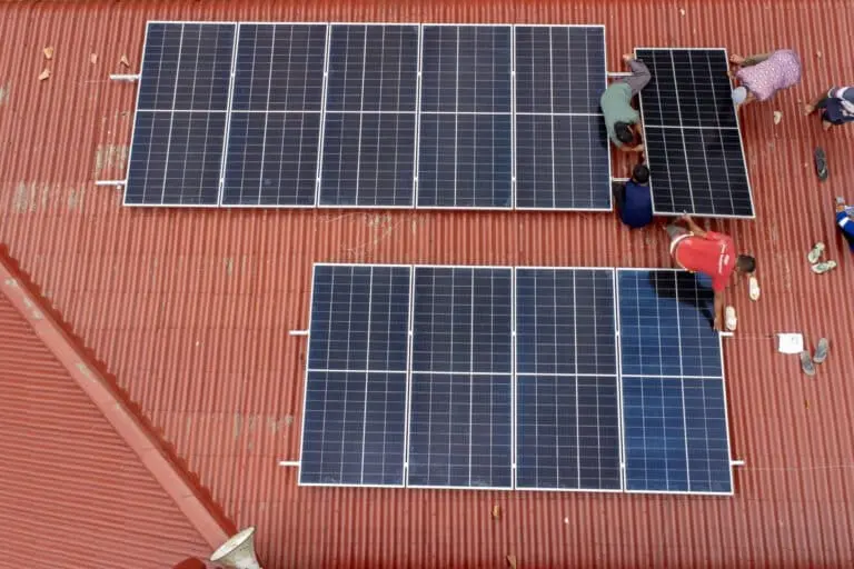 A solar power plant installation for a mosque. Image by Jaka Hendra Baittri/Mongabay Indonesia.