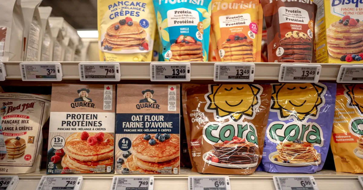 Rows of pancake products on grocery store shelves Credit: ANDREJ IVANOV/AFP via Getty Images via Sentient.