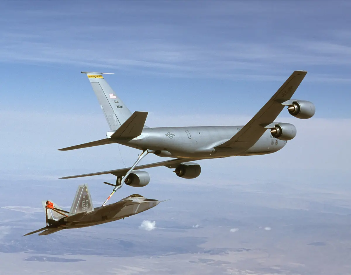 A Boeing KC-135 refuels an F-22A Raptor. The KC-135 will be replaced by the Northrop Grumman KC-45.