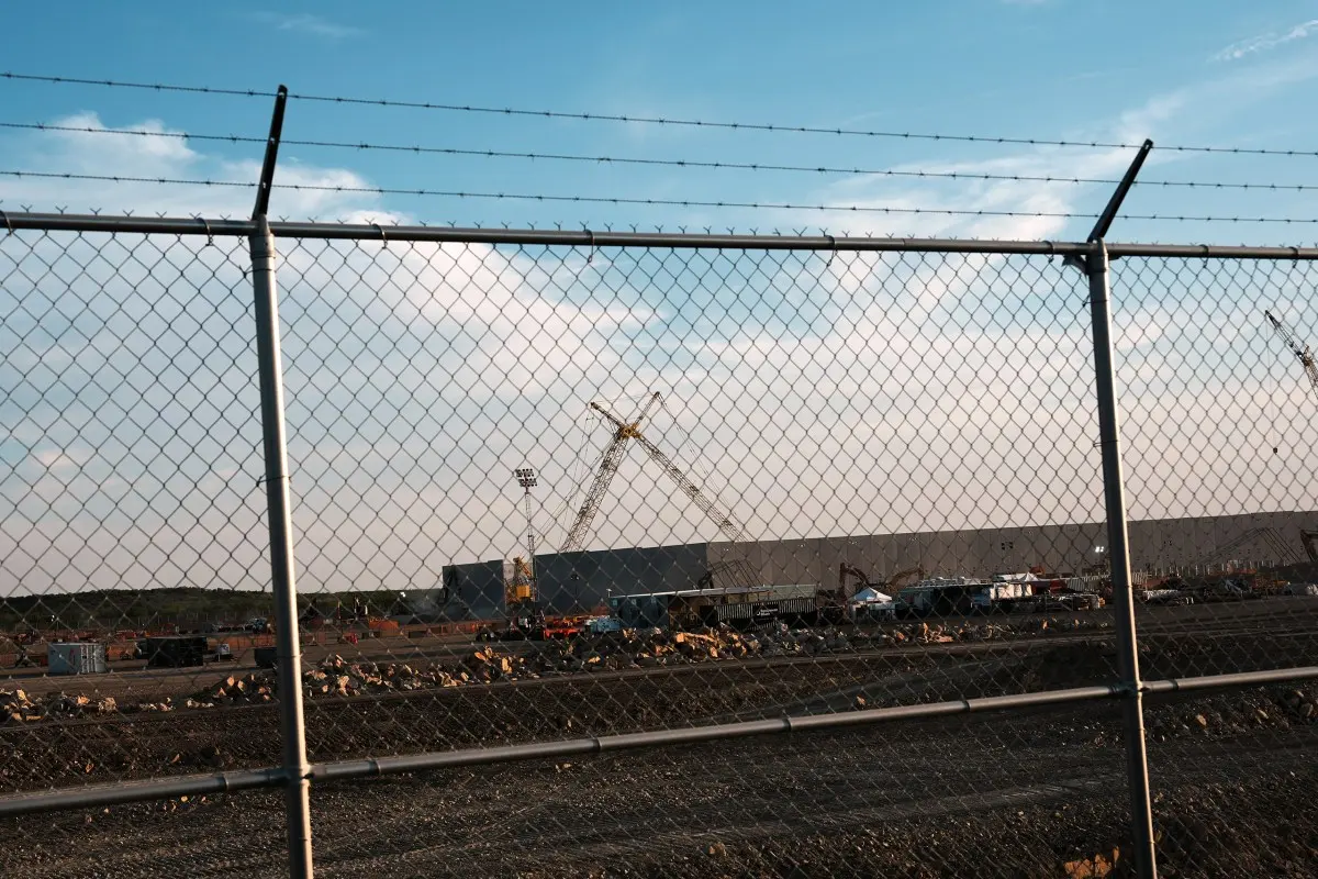 A chainlink fence separates Loop Road in south Haskell County from part of a Google data center construction site on Aug. 19, 2026.