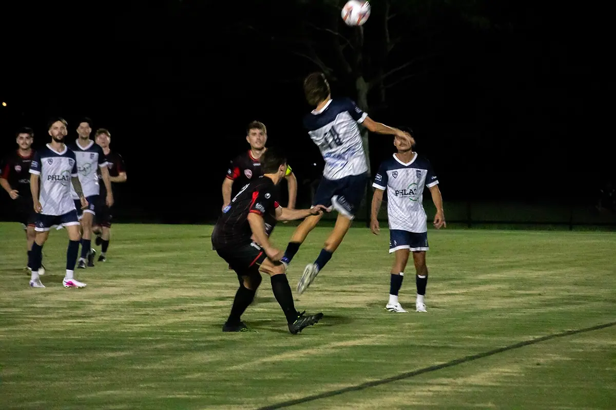 Caloundra celebrate a goal against Pacific Pines. Image: Patrick Gillett.
