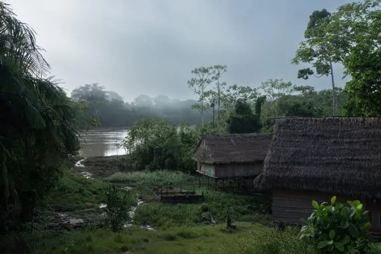 Indigenous community overlooking the Peruvian side of the Yavarí river. The Matsés were one of the groups targeted by the sustainable finance scheme. Image by Florence Goupil for Mongabay.