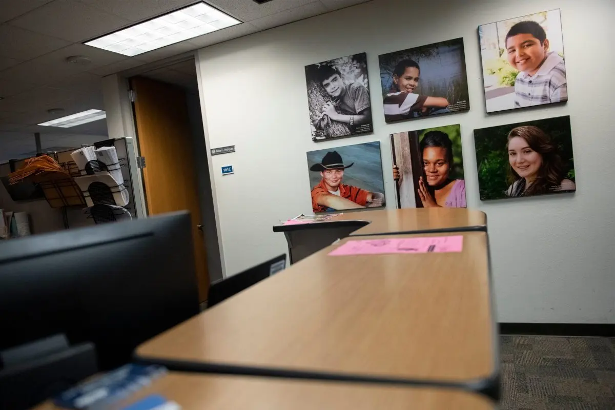 Heart Galleries, portraits of adoptable children, on display at the Child Protective Services office at the Texas Department of Family and Protective Services offices in Austin in 2019.