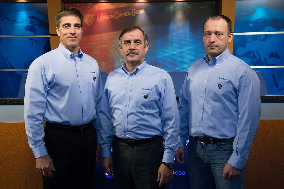 Christopher Cassidy, Pavel Vinogradov, and Aleksandr Misurkin (pictured left-to-right) launched Thursday to the ISS on a record-breaking flight, arriving just under six hours after liftoff. Image: NASA/Robert Markowitz.
