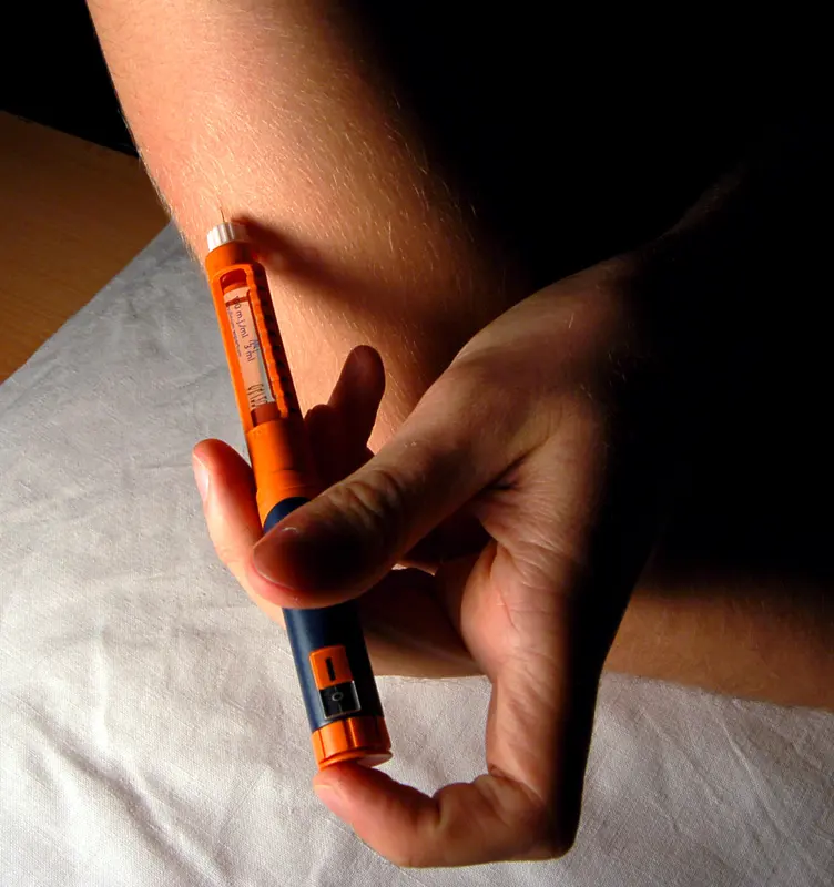 A person applying insulin treatment to self.Image: Mr Hyde.