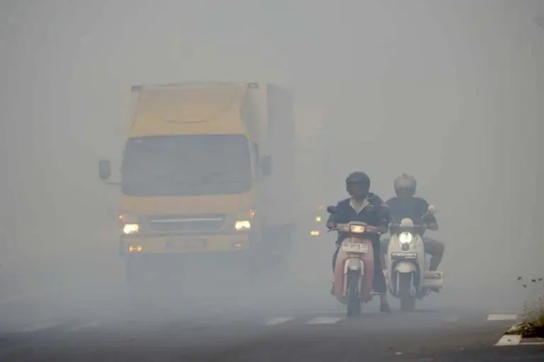 Haze caused by forest and land fires on the Palembang-Indralaya Highway on Sept. 11.