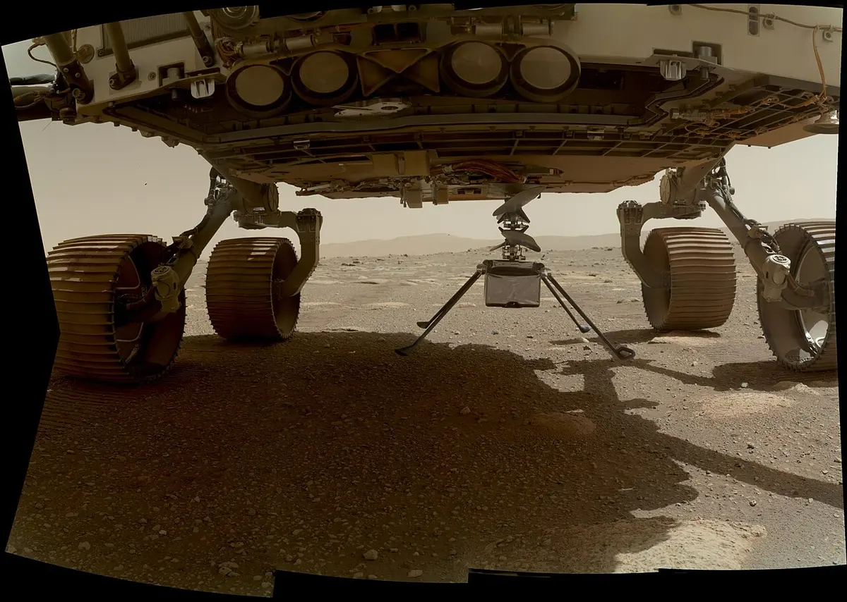 NASA's Ingenuity helicopter can be seen here with all four of its legs deployed before dropping from the belly of the Perseverance rover on March 30, 2021, the 39th Martian day, or sol, of the mission.Image: NASA/JPL-Caltech.