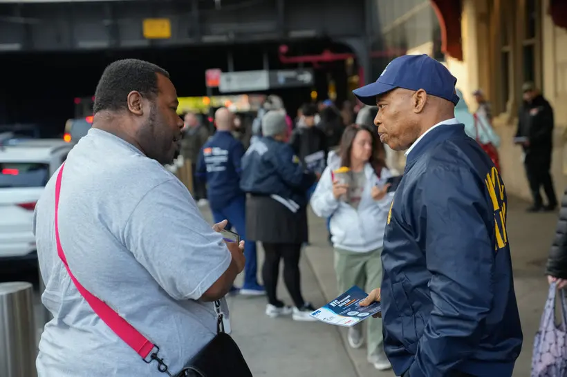 Eric Adams hands out fliers for a hiring hall in Queens on Thursday April 27, 2023. | Michael Appleton/Mayoral Photography Office