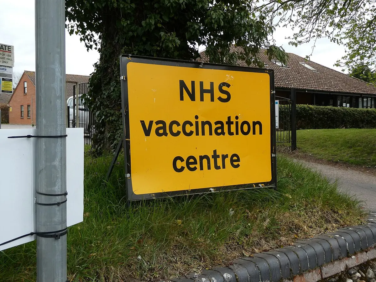 Sign indicating an NHS vaccination centre in Attleborough, Norfolk, England on April 25, 2021. Image: User:Sebastiandoe5.