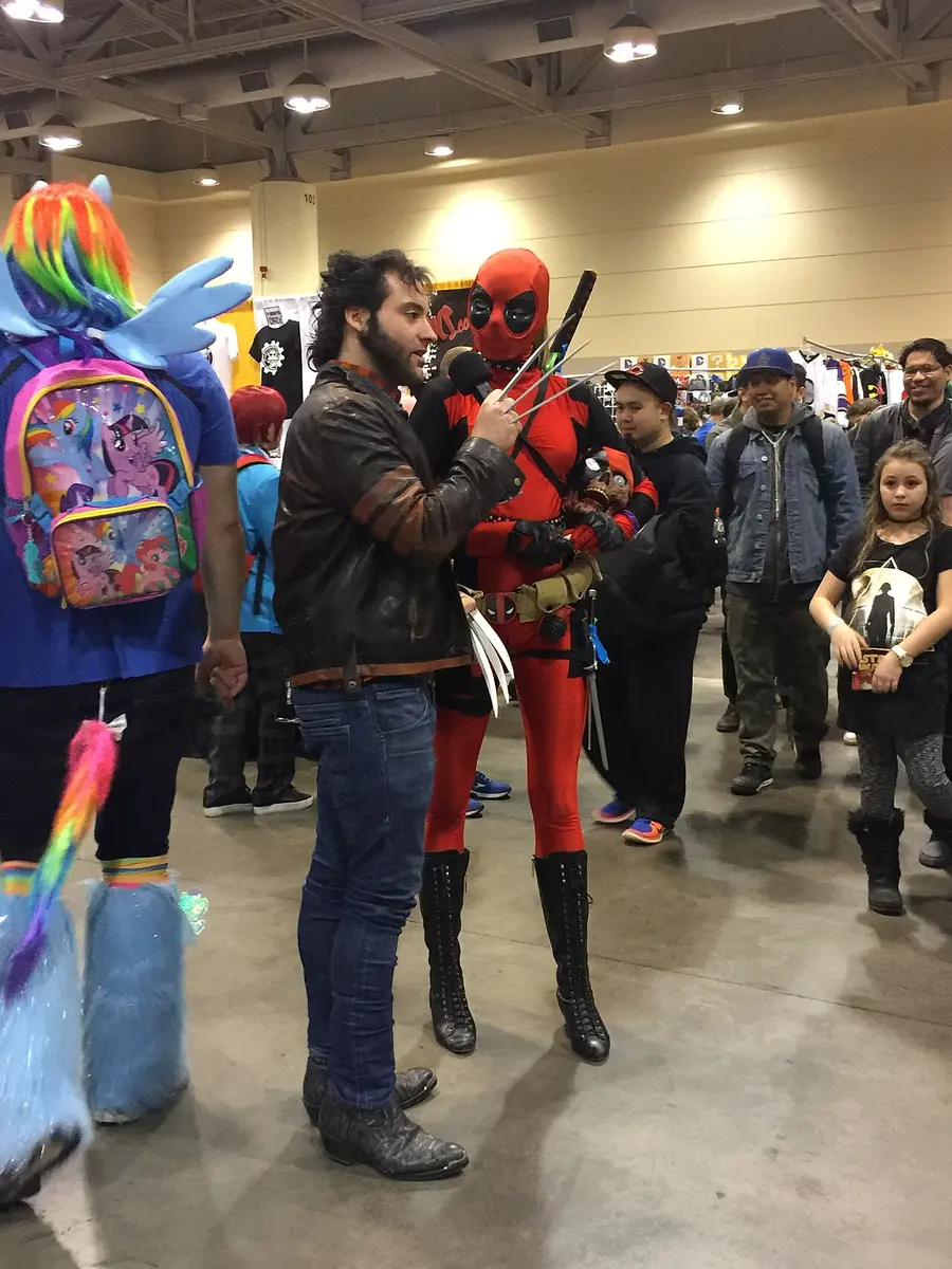 A woman in a Lady Deadpool outfit, known under the pseudonym "Tumbling Cosplay", is interviewed. Image: Nick Moreau.