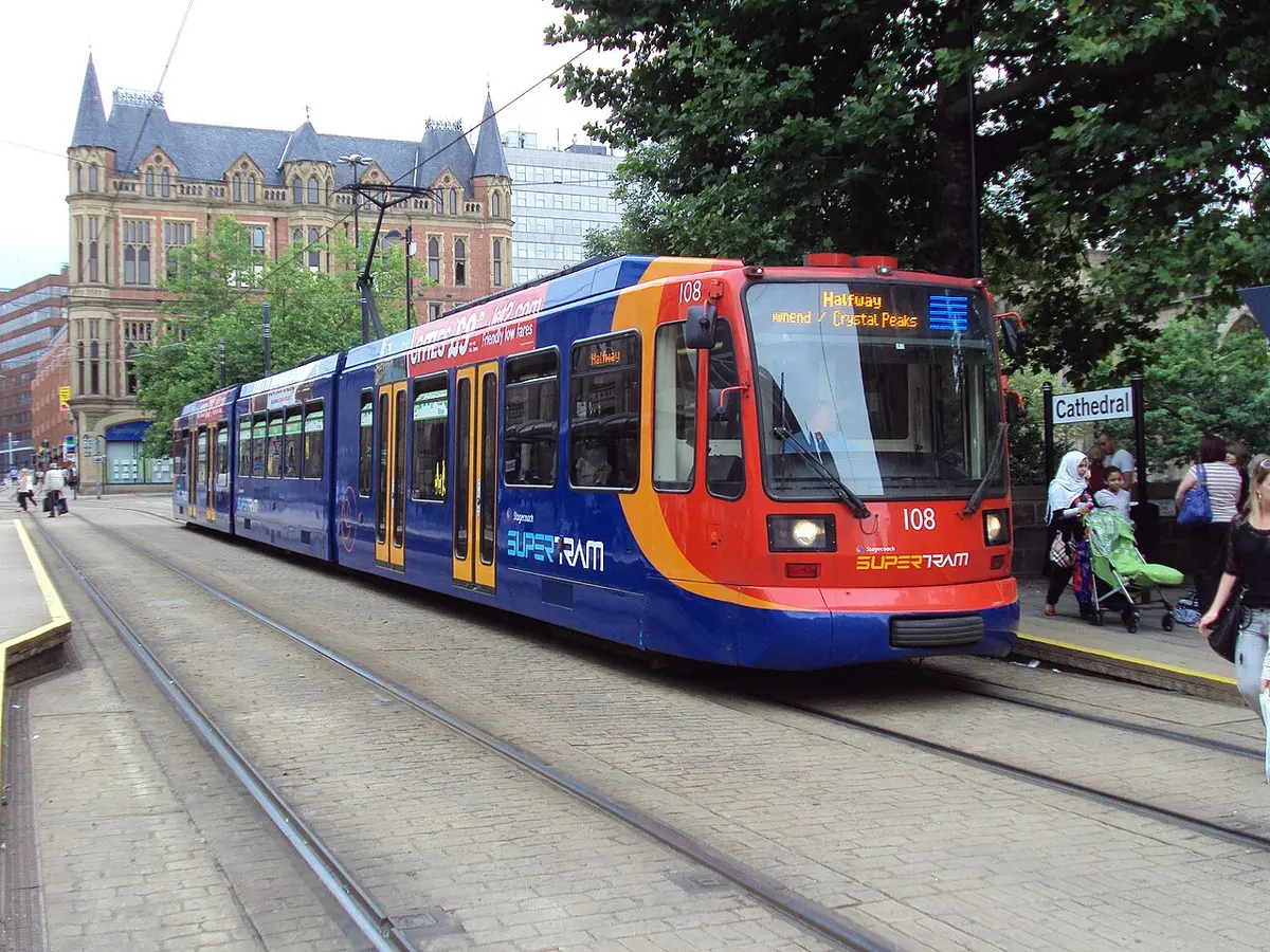 One of Sheffield's current Supertrams, pictured at Cathedral tram stop. If proposals are successful, these could be supplemented by a number of tram-trains – the first in the UK. Image: Green Lane, Wikimedia Commons.