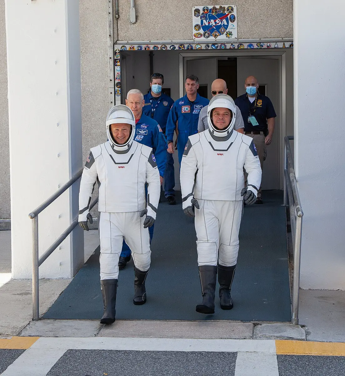 Doug Hurley (left) and Bob Behnken walk towards the launch pad at Kennedy Space Center for a dress rehearsal May 23; the two launched successfully aboard a SpaceX Falcon 9 rocket yesterday.Image: NASA/Brandon Garner.