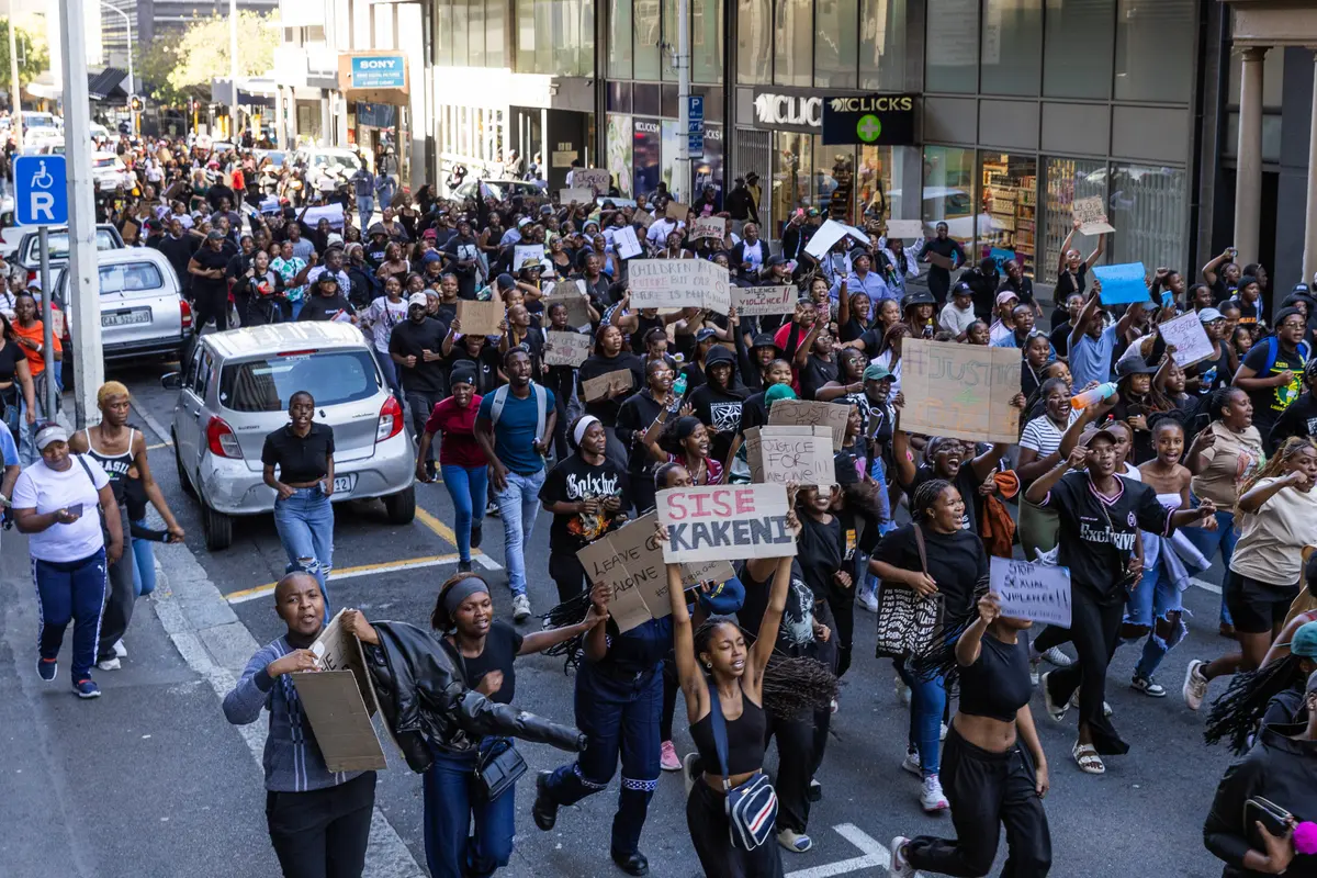 Protesters march through the streets of Cape Town’s city centre on Tuesday. Photo: Ashraf Hendricks
