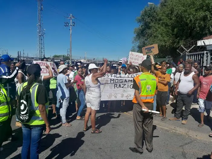 Dozens of Delft residents protested outside the community health centre on Wednesday demanding improved treatment. Photo: Vincent Lali