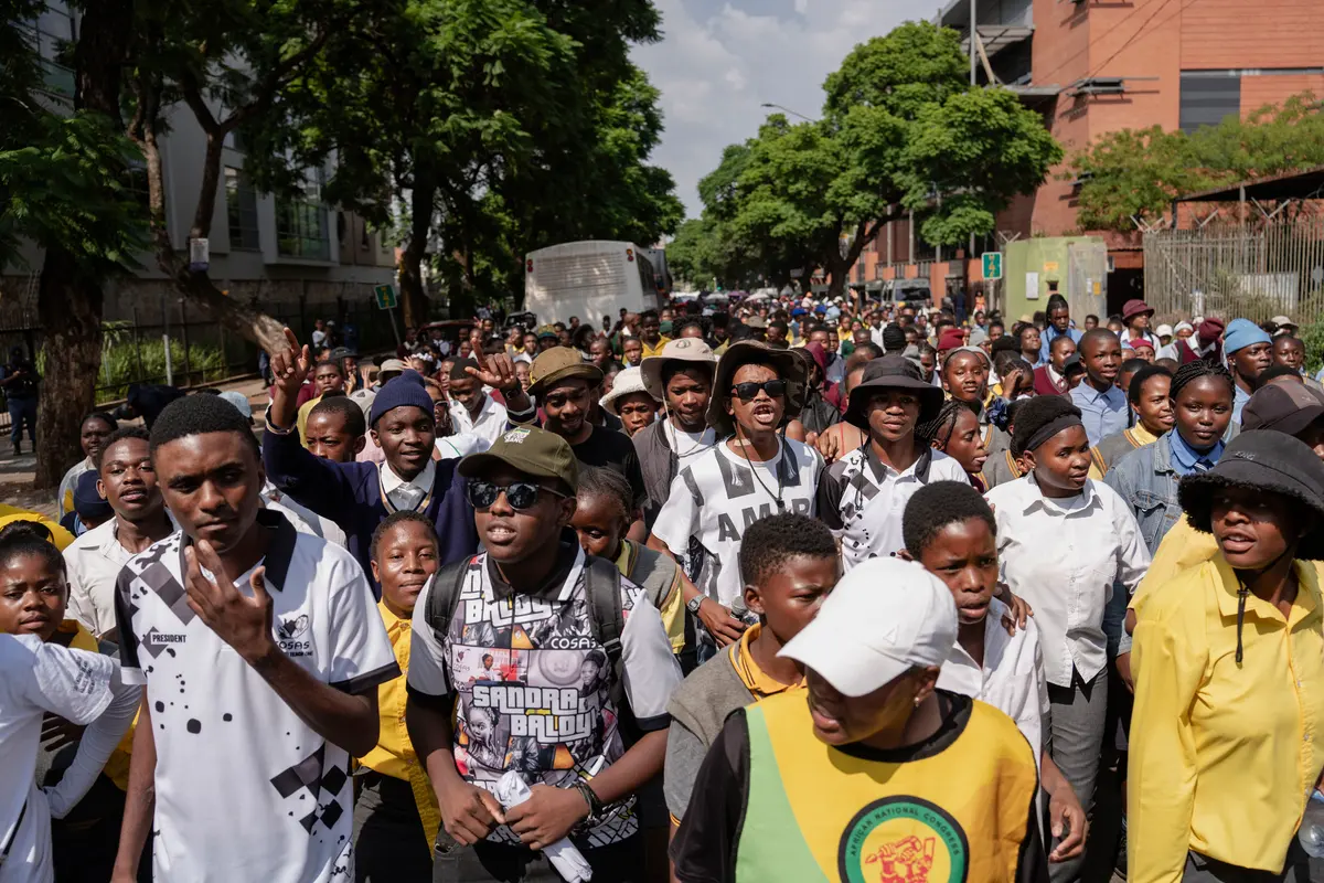 Learners from schools across Gauteng and the North West march to the Department of Basic Education’s head office in Pretoria on Thursday. Photos: Ihsaan Haffejee