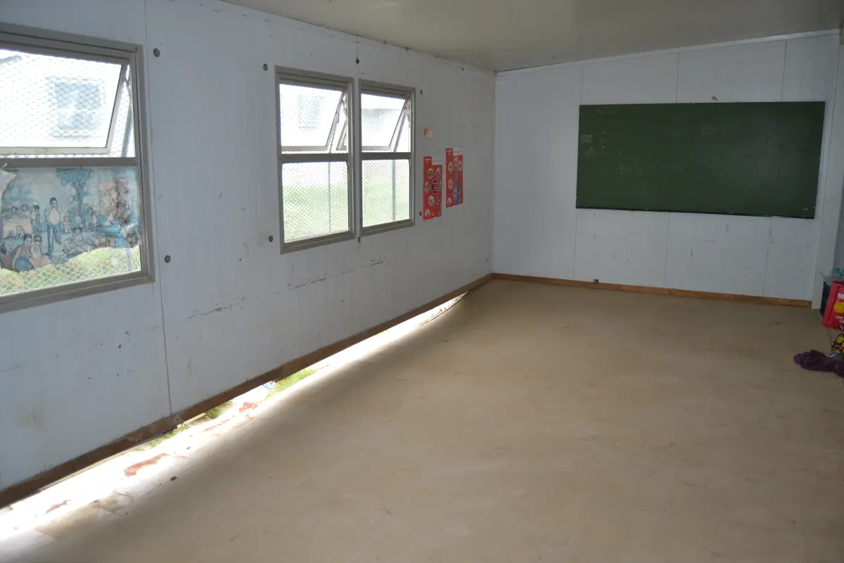 This grade 2 class was abandoned as the floor is collapsing.