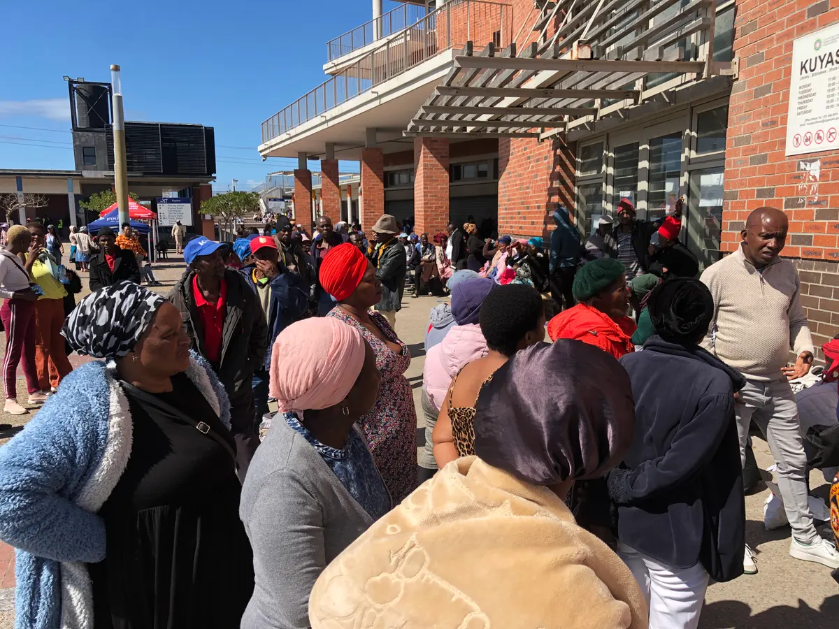 Over a hundred people stood in a long queue on Monday outside the South African Social Security Agency (SASSA) office in Khayelitsha on the first day for medical bookings and appointments. Photos: Mary-Anne Gontsana