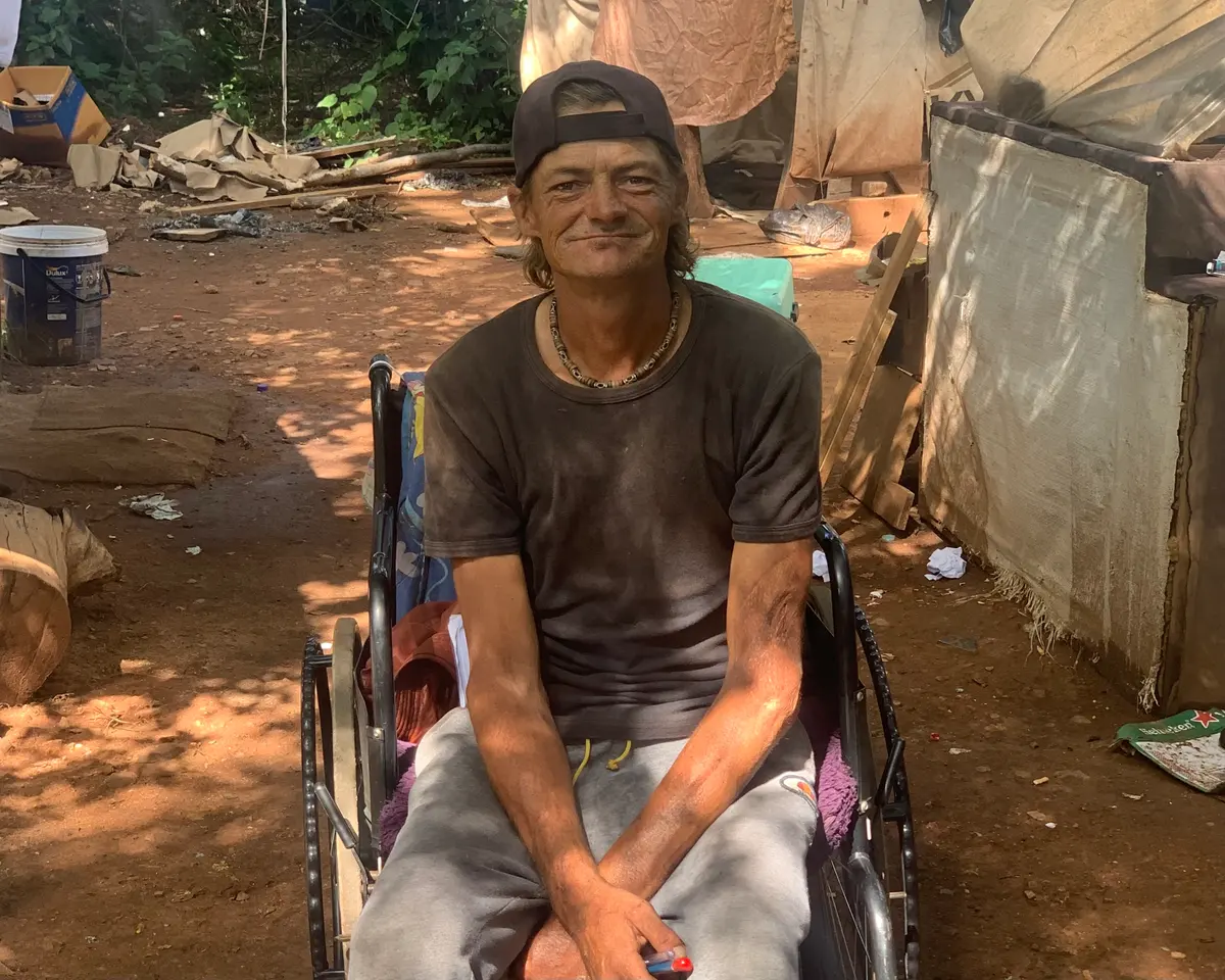 Christoffel de Jongh in the tented community where he lives in central Pretoria. He relies on a US-funded health facility for his HIV medicines as well as methadone. Photos: Jesse Copelyn